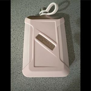 Light pink Brumate flask with brushed silver hardware